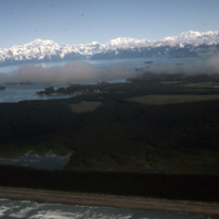 Looking north over Yakutat with Yakutat Bay and St. Elias Range in the distance.