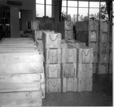 Surplus Ammunition Boxes - Used for Transferring Books to the New ACC Campus; ca. 1969. 