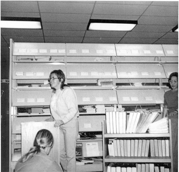 Library Staff Moving the ACC Book collection to the New Library; 1973.